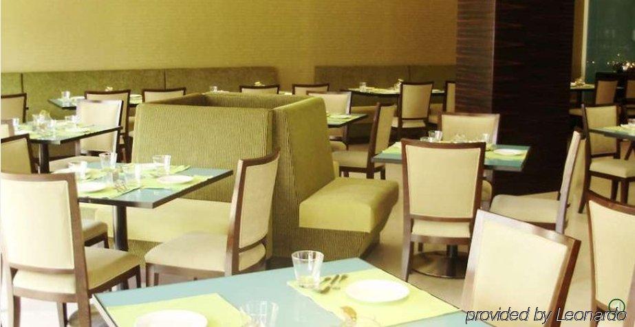 Radha Regent Electronic City Kammasandra Restaurant bilde